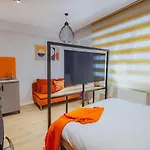 Marcian's Column - Orange And Blue Hotell